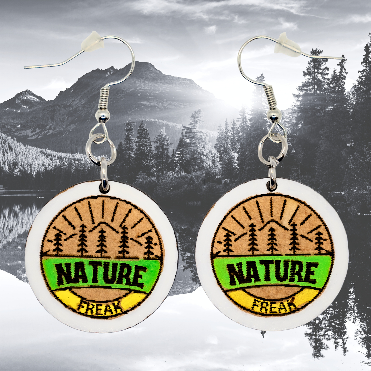 Round outdoor lover earrings with Nature Freak text”