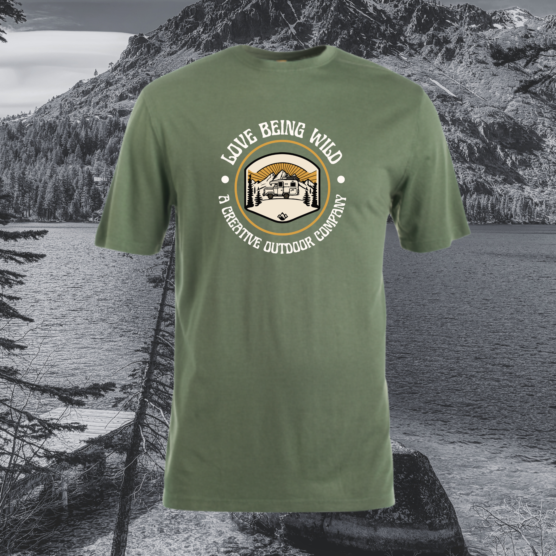 Green shirt with Love Being Wild Design on chest with nature scene in background