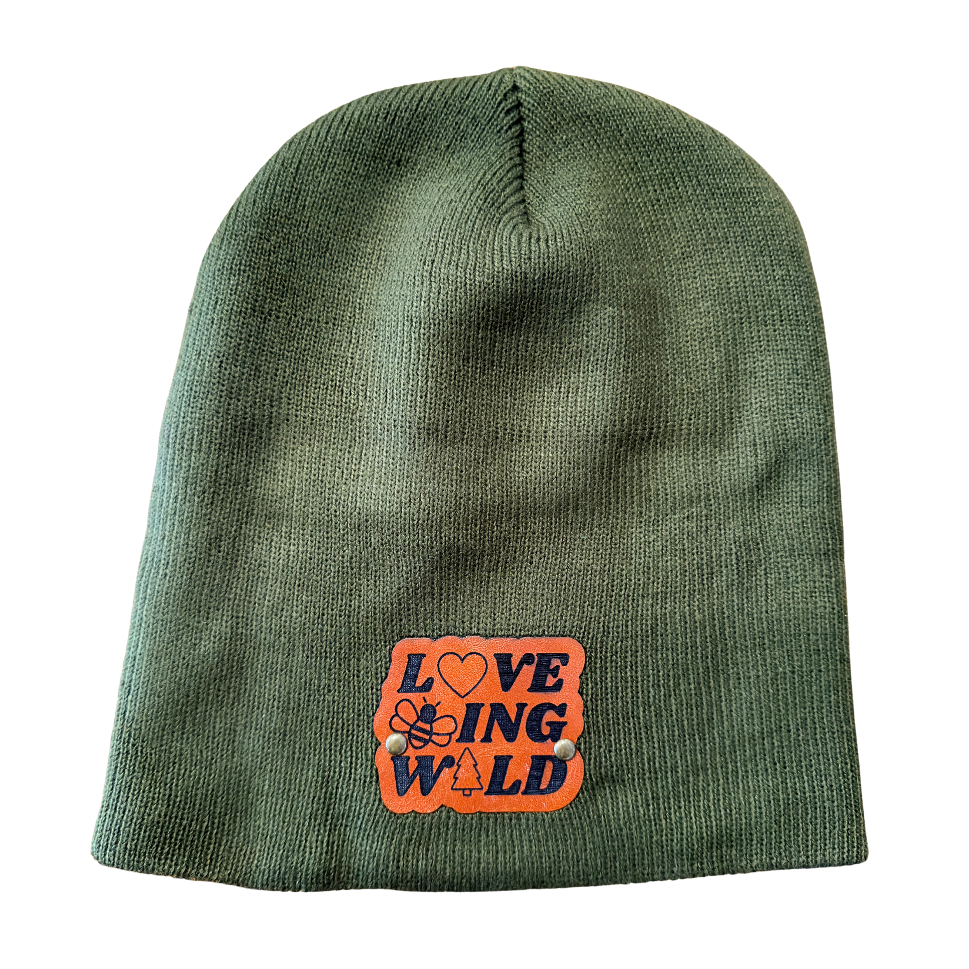 Green beanie with an orange patch featuring text and symbols on a white background