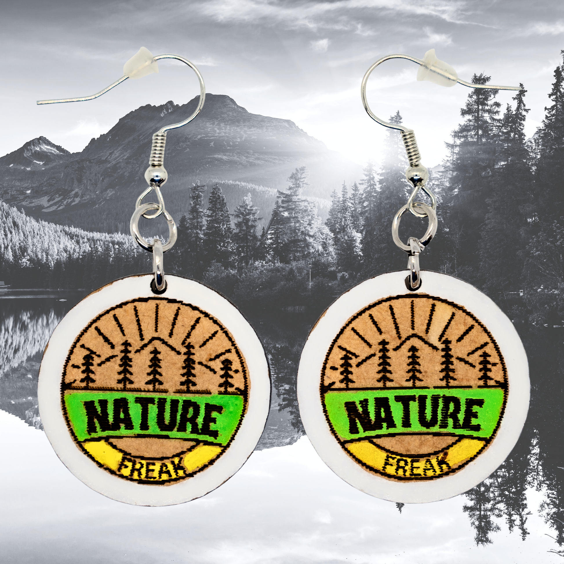 Round outdoor lover earrings with Nature Freak text”