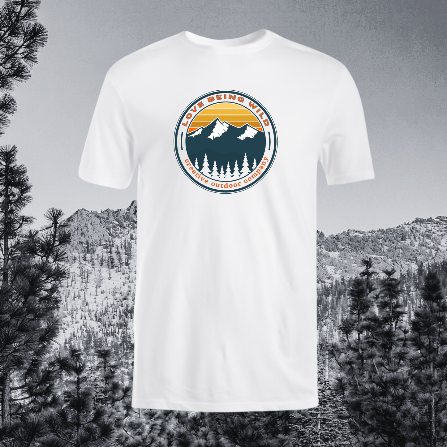 White t-shirt with a mountain graphic and text on a gray background