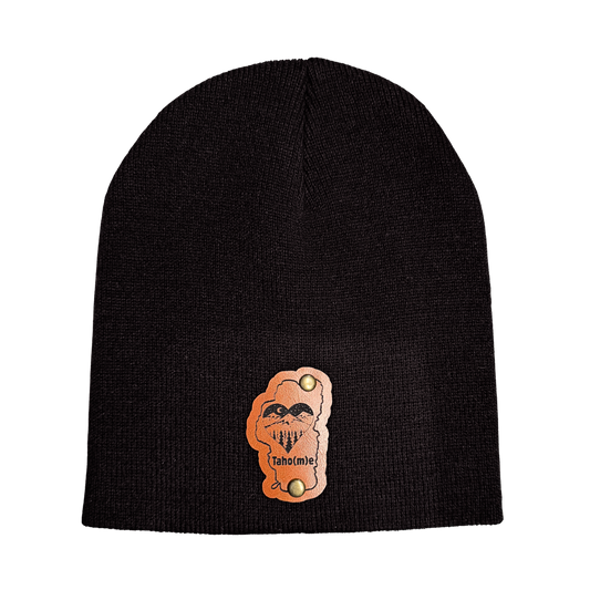 Black beanie with an orange and white logo on a white background